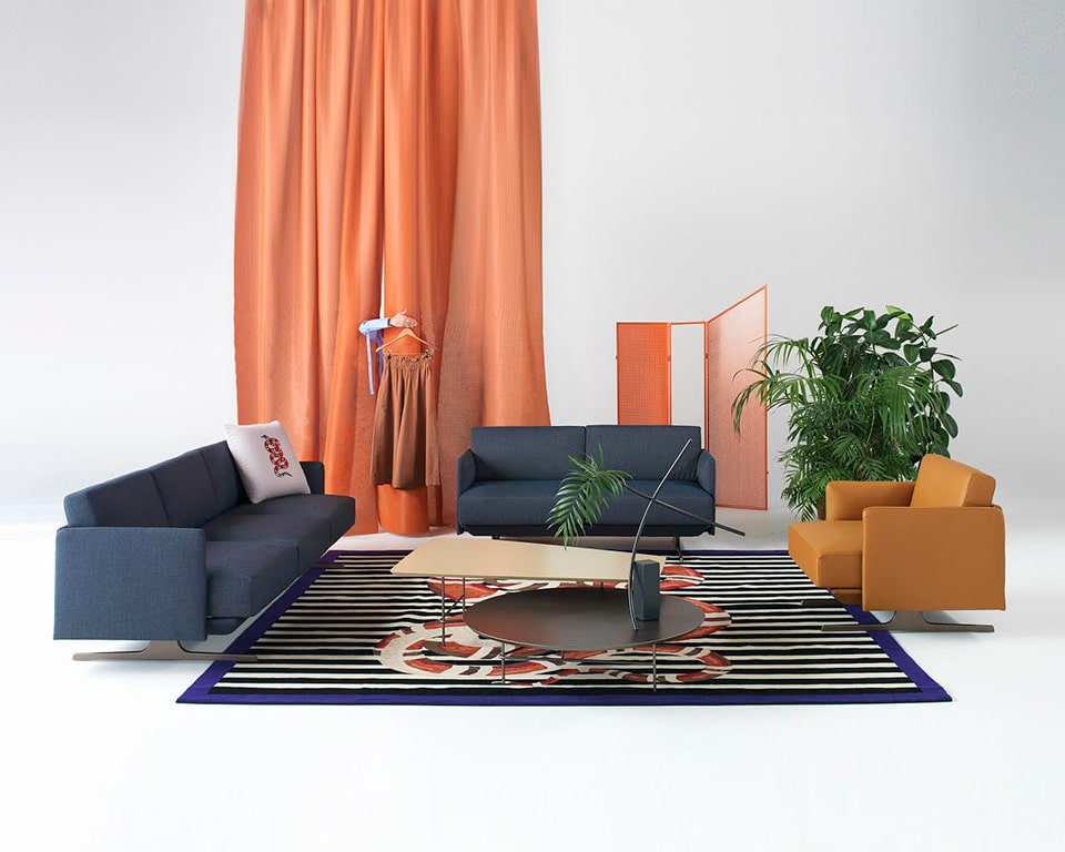designer arm chair and Italian sofa range in blue fabric