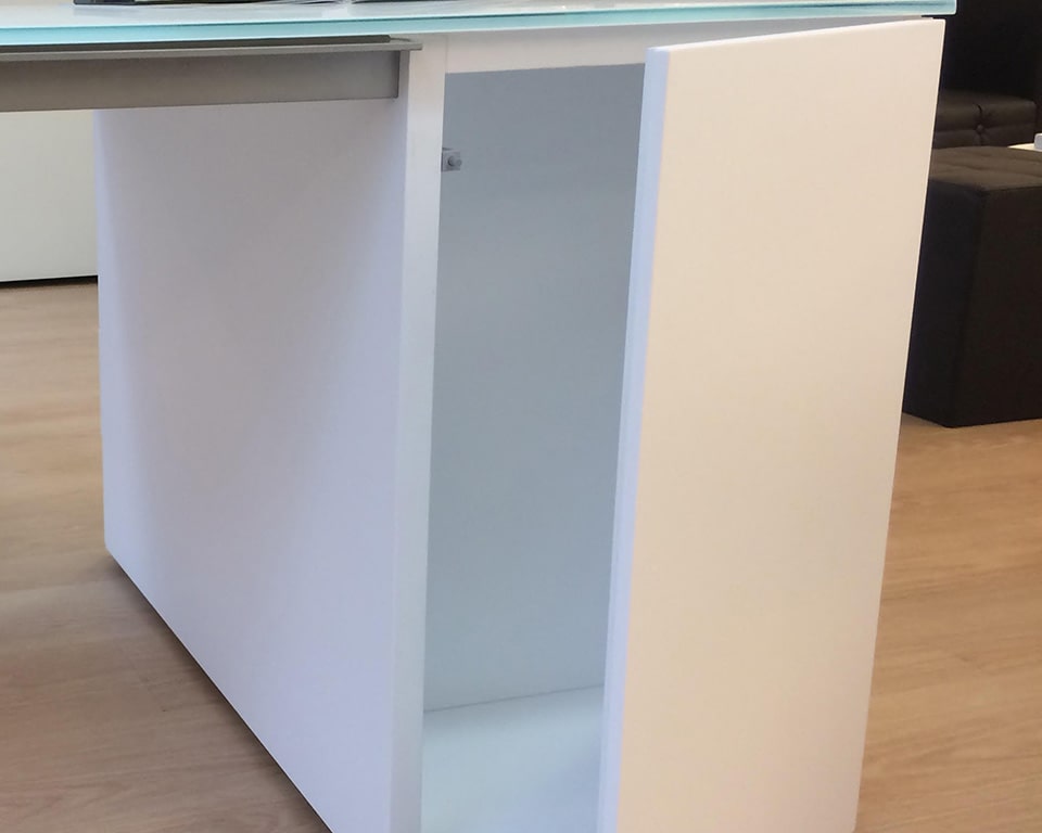White glass and white lacquered executive office desks with wire management