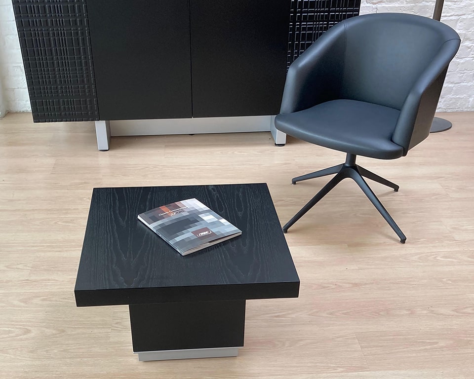 Taiko Luxury Executive coffee tables in black ash wood to match the Taiko executive desks and tables. Shown here with a matching Rica high end executive boardroom chair