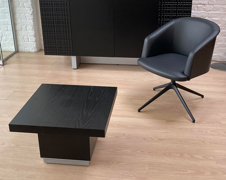 Taiko Luxury Executive coffee tables in black ash wood to match the Taiko executive desks and tables. Shown here with a matching Rica executive boardroom chair