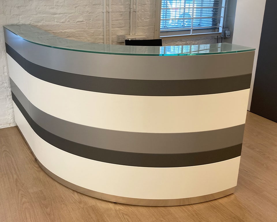 Luxury premium quality Designer reception desks and counters- Twist is a superior modular range of high - end Italian reception desks with 6 horizontal colour bands in a choice of at least 15 modern matt lacquered colours. These stylish reception counters are available in any sizes and shapes suitable for a single user or multiple users