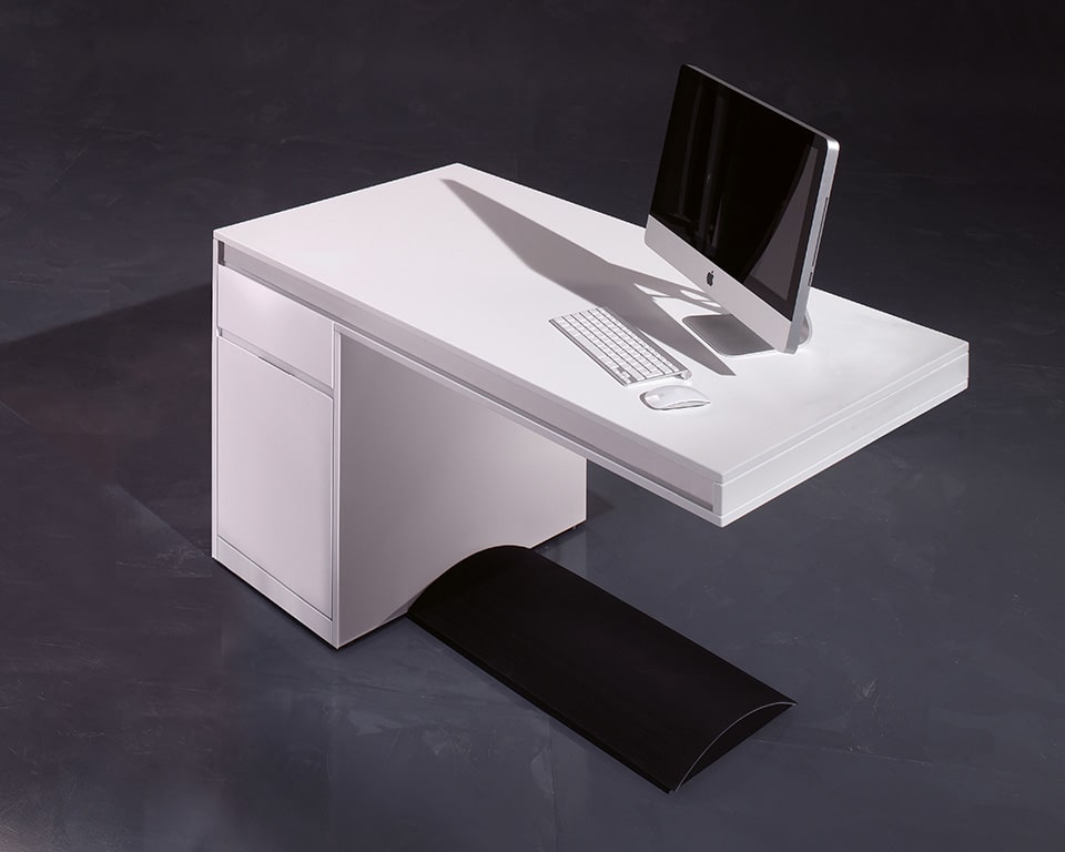 Small home office desk 1300 x 800 in matt white with storage and full cable management shows black support foot