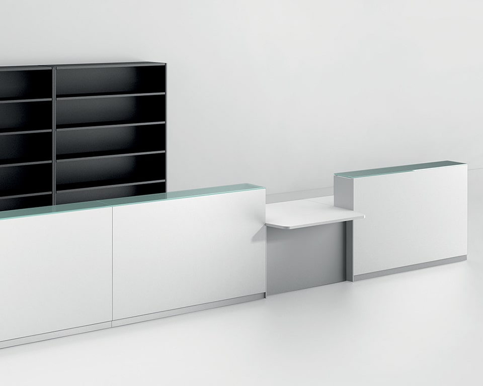 White reception desk with glass counter tops and DDA reception desk module