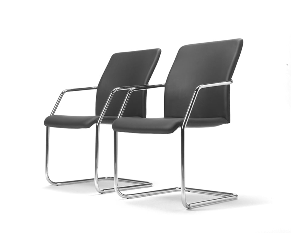 Chrome cantilever meeting and boardroom chairs. Stackable up to four chairs. Upholstered in Real Italian leather or high quality fabrics