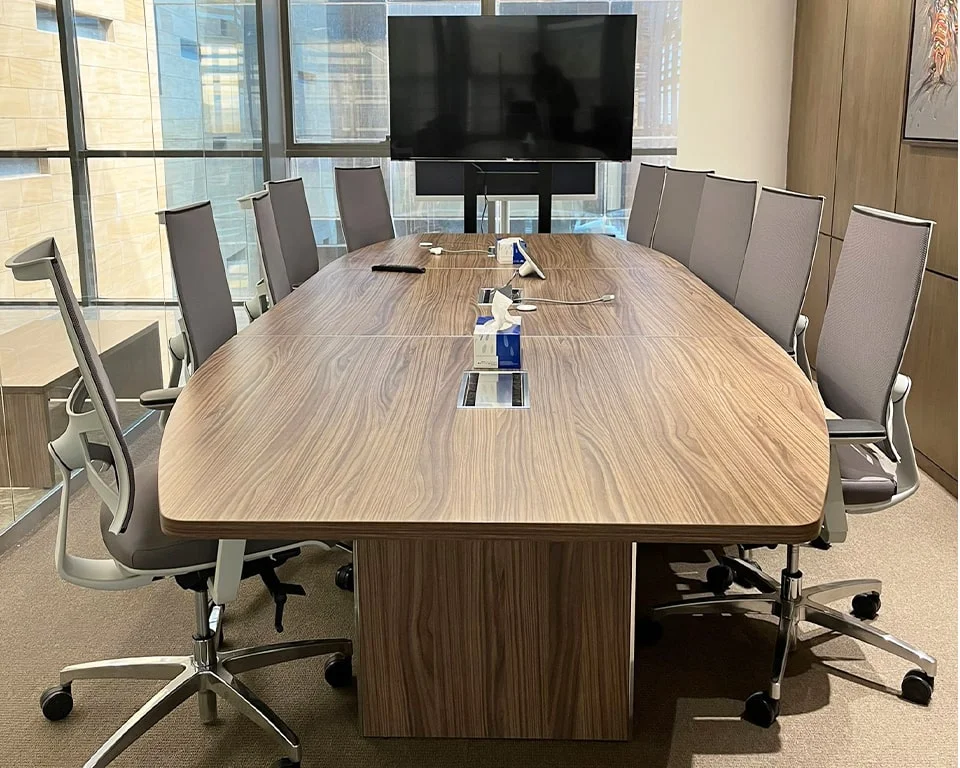 stunning boat shaped boardroom table  with top access boxes