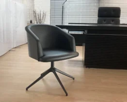 stunning black leather swivel chair with a black ash wood back