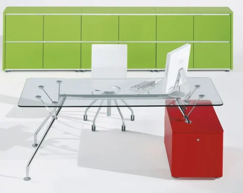 Large clear glass top designer desk with red drawers