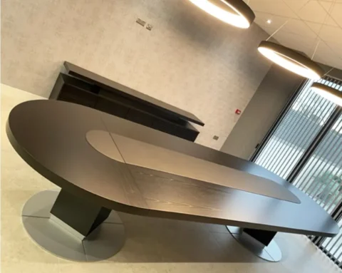 Large d ended boardroom table in real wood and italian leather