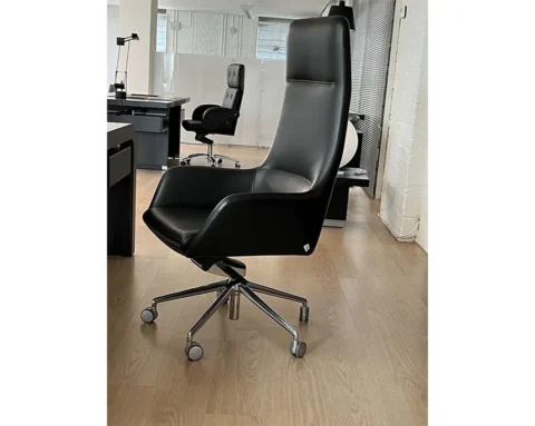 Black leather high back executive chair with a headrest
