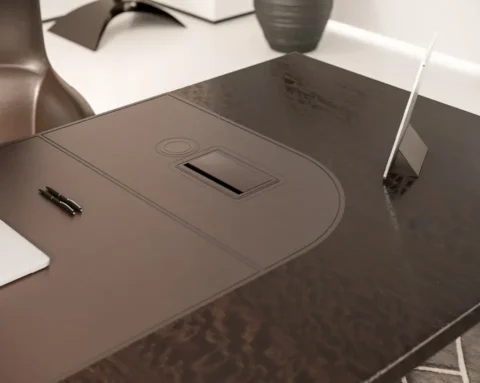 Ceo desk with luxurious saddle stitched leather inlaid desk top