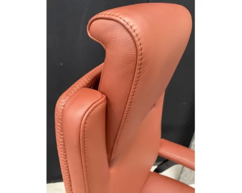 Luxury executive chair with an adjustable headrest