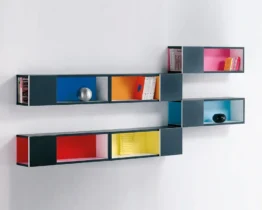designer wall mounted shelving boxes in contrast colours