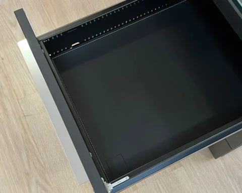 Luxurious saddle stitched leather drawer bottoms