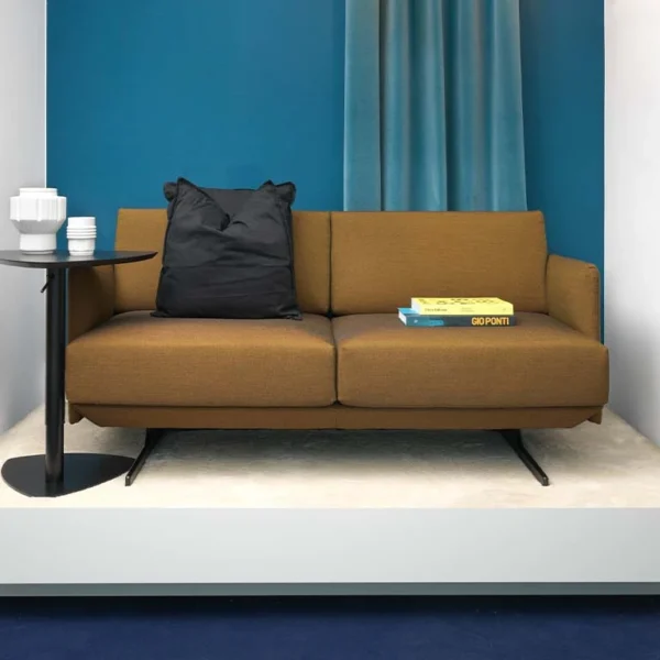 Luxury two seat sofa upholstered in fabric