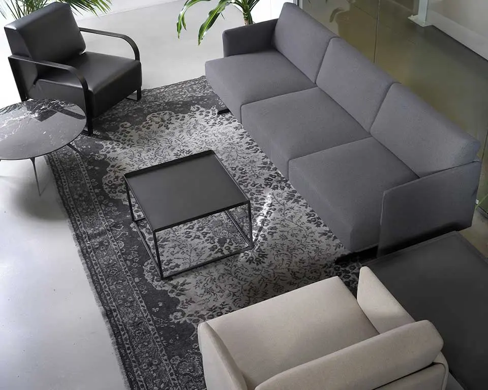 large three seater hugo sofa in a dark grey fabric