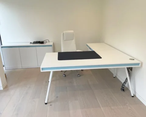 Luxury-l-shaped white desk with a light blue horizontal band