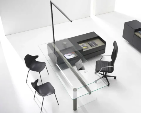 Fantastic l- shaped ceo desk with a glass desk top and legs