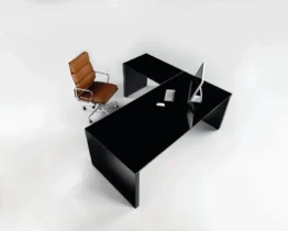 large l- shaped executive desk with shiny black glass tops