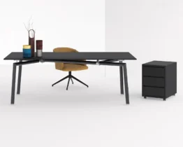 large black meeting table or desk with added mobile pedestal