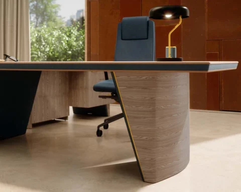 L- shaped ash wood desk with non standard gold trim