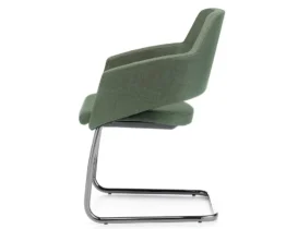 chrome cantilever chair upholstered in green fabric