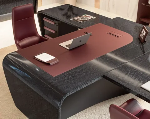 Large ceo desk with a leather inlaid top and curved leg