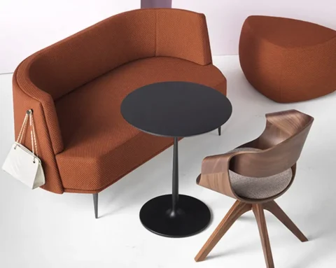 High quality club style sofa in terracotta fabric with a bag holder