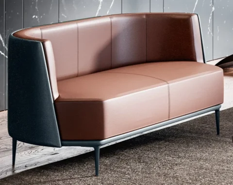 Tub style two seat sofa upholstered in italian leather