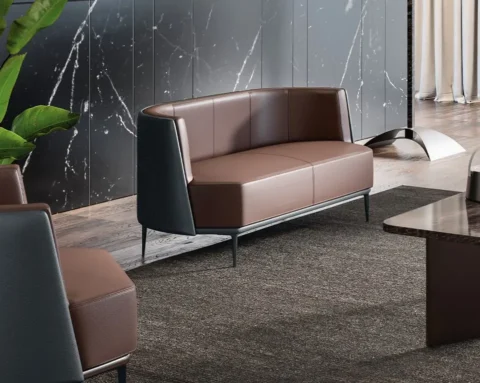 Curved two seat sofa and armchair in real italian leather