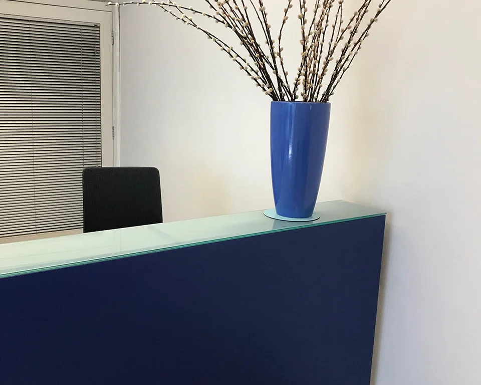 stunning small reception desk with a glass counter top