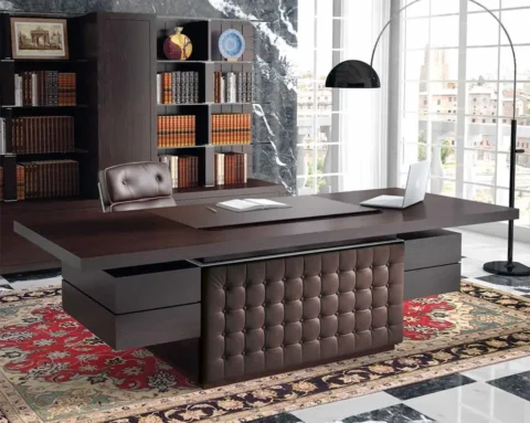 Luxury executive office desk in dark wood with a brown leather front panel
