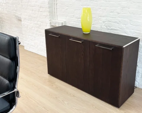 Attiva sideboard with three dark ash wood doors and chrome details