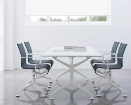 white glass rectangular meeting room table with chairs