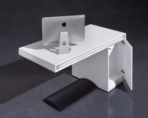 Small white home office desk with cable management