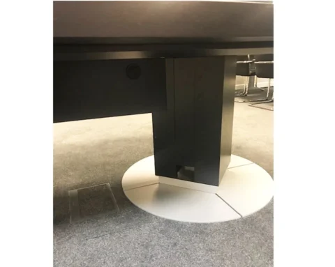 Luxury boardroom table with vertical cable management channels included