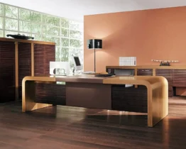 large ceo desk in italian walnut with a modesty pane in leather and wood