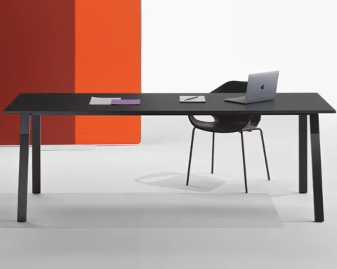 Large black desk or meeting table with black wood legs