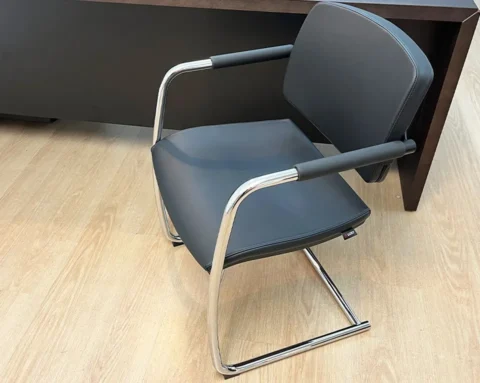 Stylish black leather meeting room chair with arms